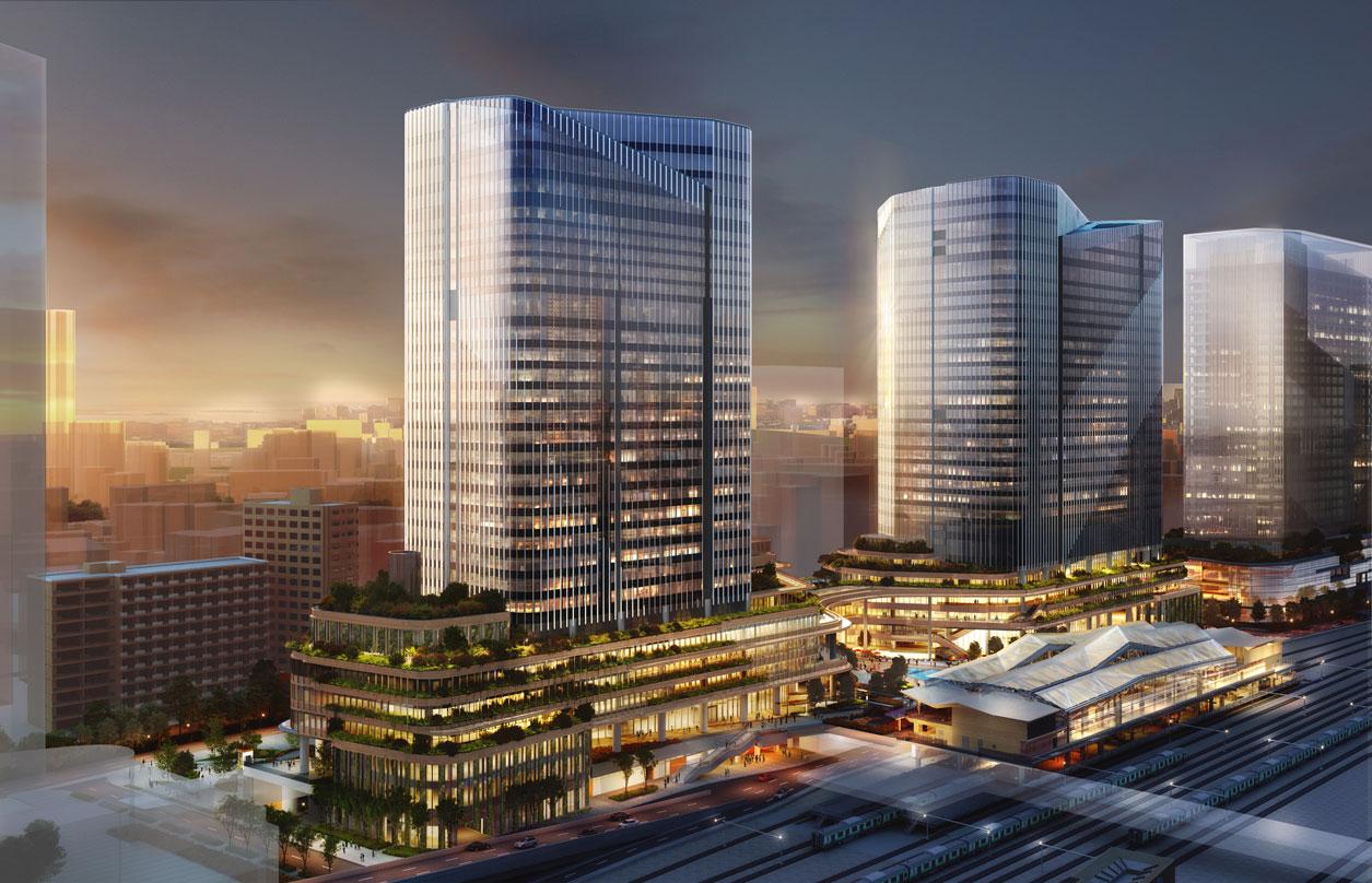 Conceptual rendering of Global Gateway Shinagawa, showcasing modern glass skyscrapers with tiered green rooftops and integrated greenery, adjacent to a transportation hub with train tracks.